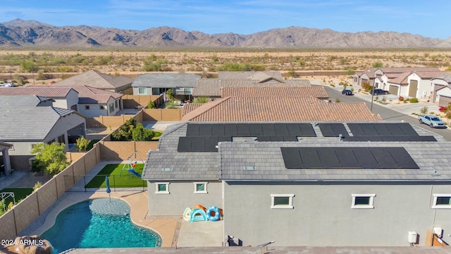 drone / aerial view featuring a mountain view