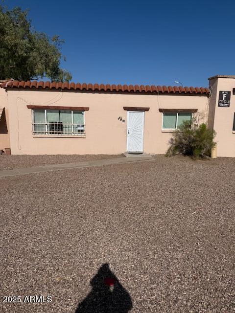 4625 W Thomas Rd Unit 48, Phoenix, AZ 85031 - mediterranean / spanish home featuring stucco siding and a tiled roof
