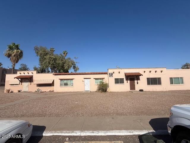 4625 W Thomas Rd Unit 48, Phoenix, AZ 85031 - pueblo revival-style home featuring stucco siding