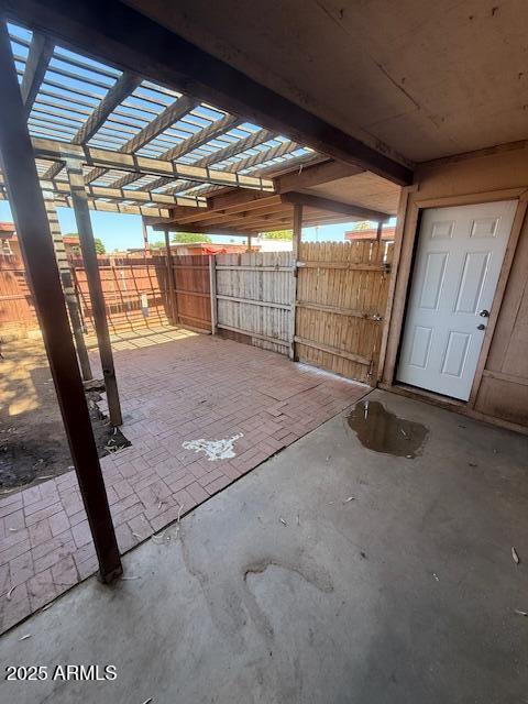 4625 W Thomas Rd Unit 48, Phoenix, AZ 85031 - fenced backyard featuring a patio area