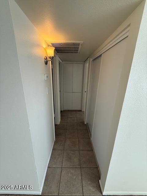 4625 W Thomas Rd Unit 48, Phoenix, AZ 85031 - corridor featuring tile patterned floors