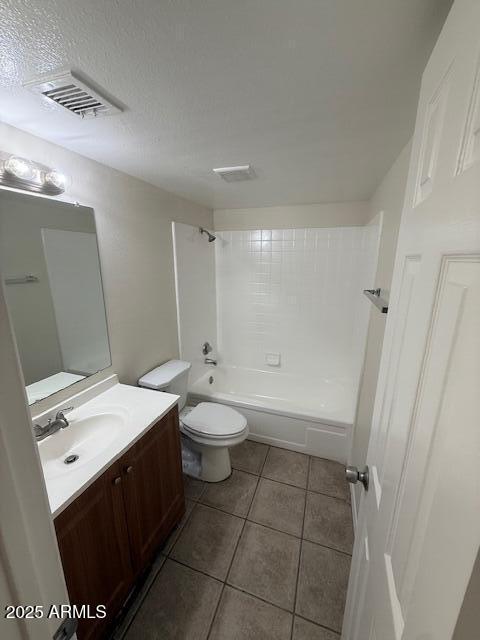 4625 W Thomas Rd Unit 48, Phoenix, AZ 85031 - bathroom featuring vanity, tile patterned floors, bathtub / shower combination, and a textured ceiling
