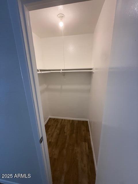 4625 W Thomas Rd Unit 48, Phoenix, AZ 85031 - walk in closet featuring wood finished floors