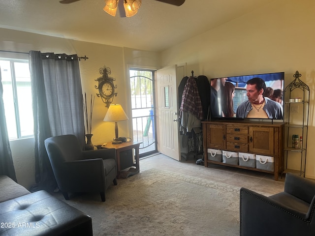 5220 W Mauna Loa Ln, Glendale, AZ 85306 - tiled living area featuring ceiling fan and healthy amount of natural light