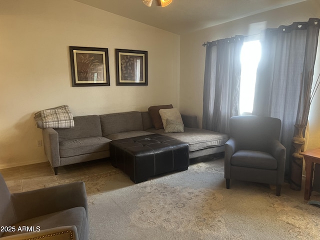 5220 W Mauna Loa Ln, Glendale, AZ 85306 - living room featuring vaulted ceiling and baseboards