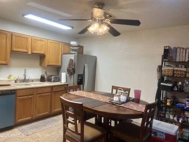 5220 W Mauna Loa Ln, Glendale, AZ 85306 - kitchen with a sink, dishwasher, a ceiling fan, stainless steel fridge with ice dispenser, and light tile patterned flooring