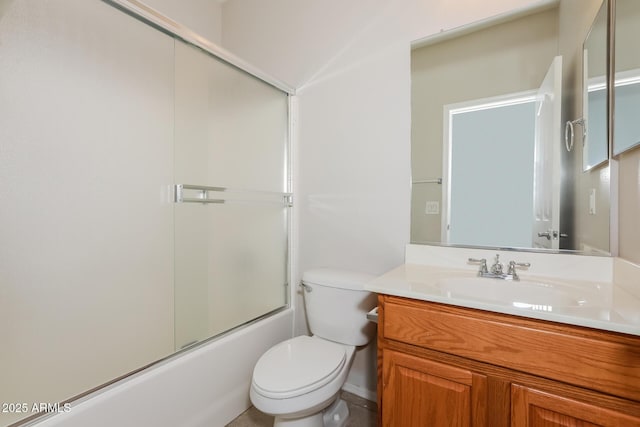 2475 E Vermont Dr, Gilbert, AZ 85295 - bathroom featuring toilet, vanity, and shower / bath combination with glass door