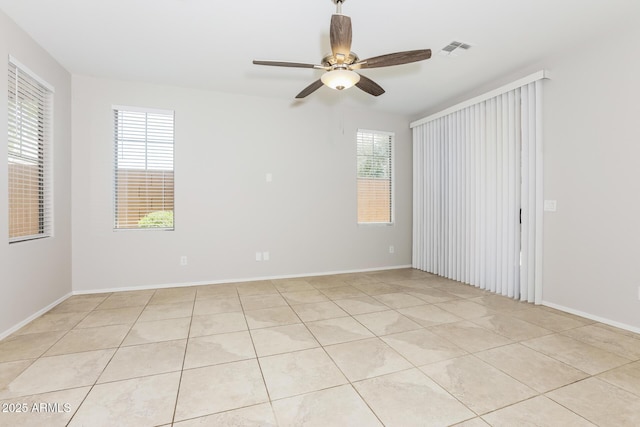2475 E Vermont Dr, Gilbert, AZ 85295 - spare room with a ceiling fan and baseboards
