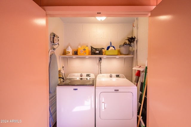 laundry room with independent washer and dryer