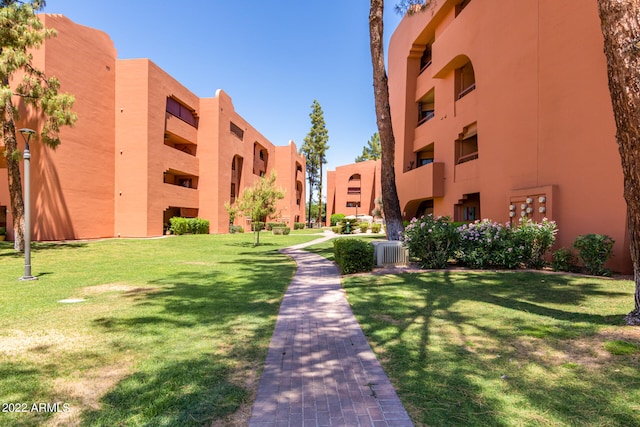 view of property featuring central AC unit