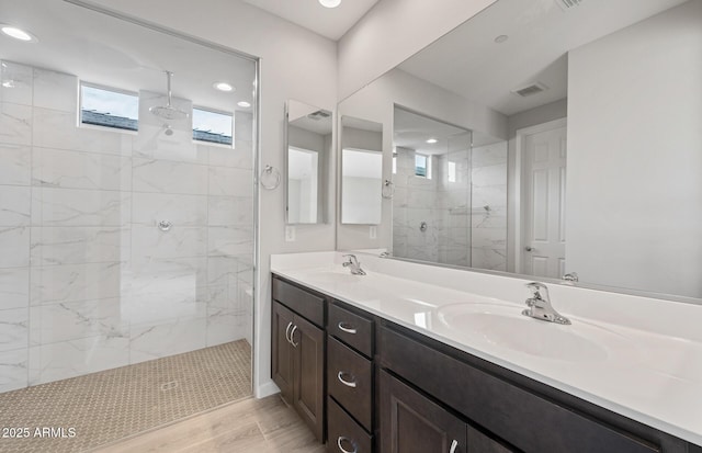 13512 W Copperleaf Ln, Peoria, AZ 85383 - full bath featuring walk in shower, double vanity, wood finished floors, and recessed lighting