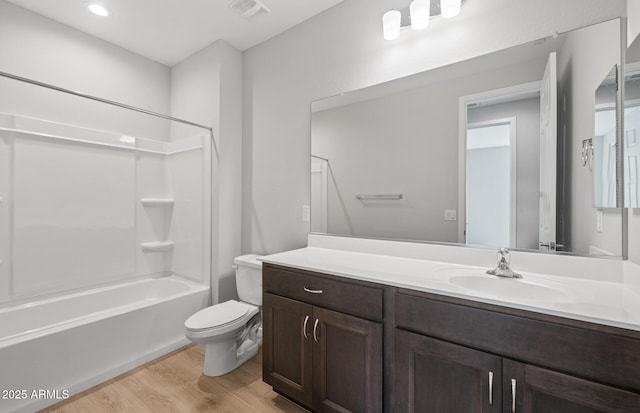 13512 W Copperleaf Ln, Peoria, AZ 85383 - bathroom with wood finished floors, vanity, and washtub / shower combination
