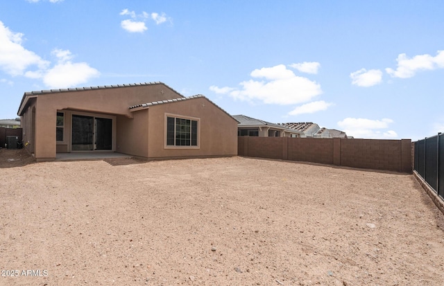 13512 W Copperleaf Ln, Peoria, AZ 85383 - rear view of property with a fenced backyard, stucco siding, and a tile roof