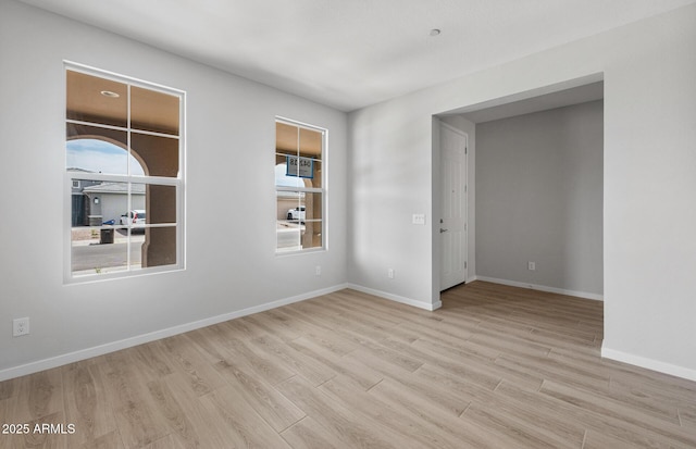 13512 W Copperleaf Ln, Peoria, AZ 85383 - spare room with wood finished floors and baseboards
