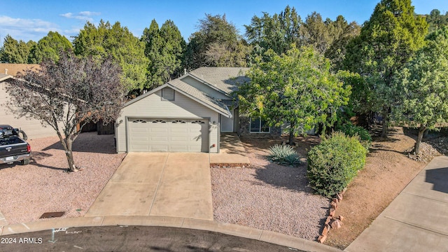 view of front of property featuring a garage