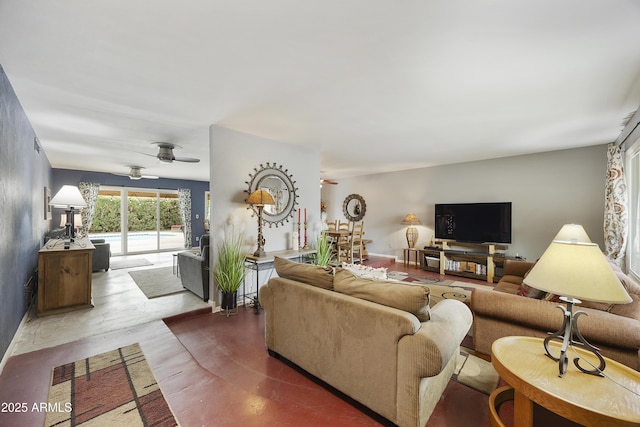 living area featuring ceiling fan and wood finished floors