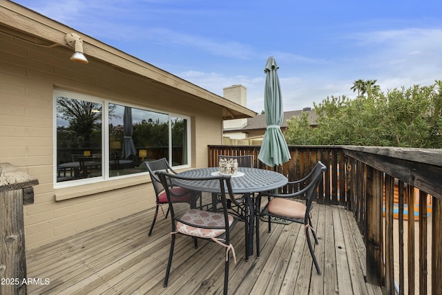 deck featuring outdoor dining space