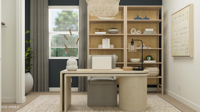 office area featuring carpet floors and baseboards