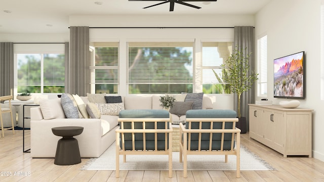 living room featuring light wood-style floors and ceiling fan