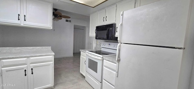 kitchen with white appliances, white cabinets, and ceiling fan