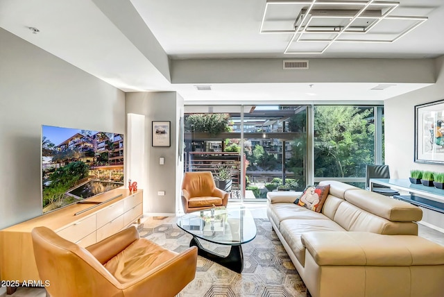 living room featuring expansive windows