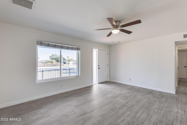 unfurnished room featuring ceiling fan