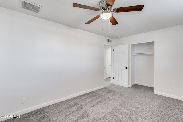 unfurnished bedroom with carpet flooring, a closet, and ceiling fan