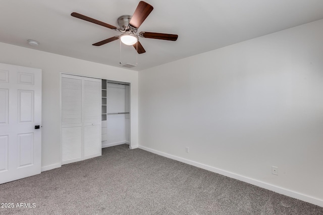 unfurnished bedroom with a closet, ceiling fan, and carpet