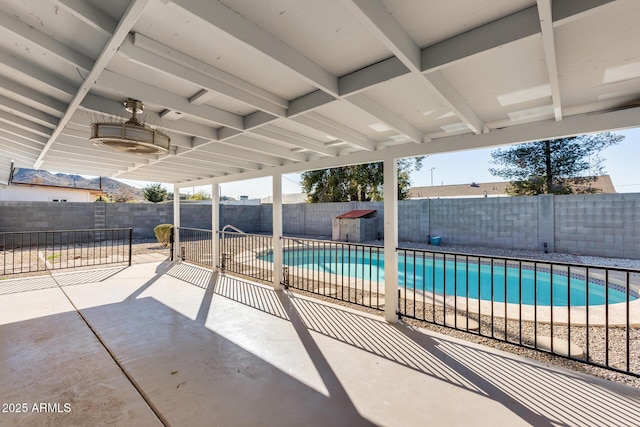 view of swimming pool featuring a patio