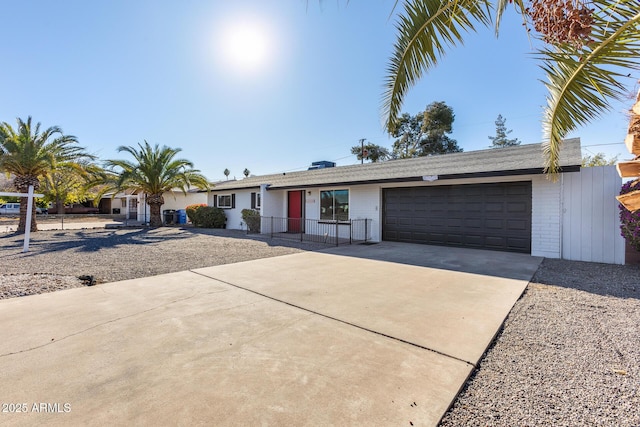 ranch-style home with a garage