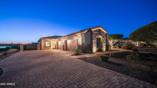 view of front of home with a garage