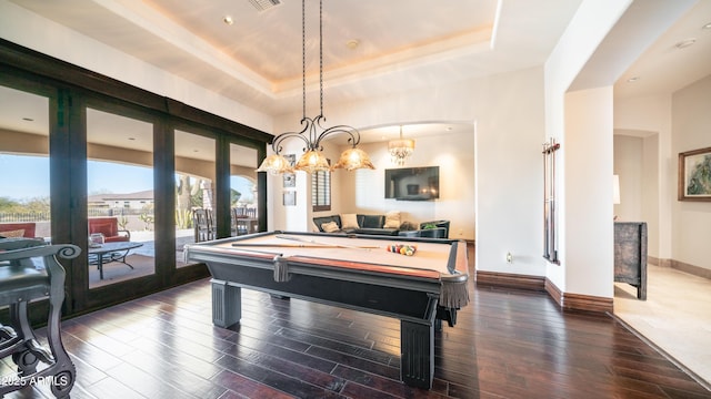 rec room with hardwood / wood-style flooring, pool table, french doors, and a tray ceiling