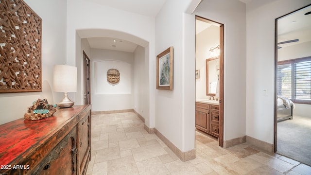 hallway featuring sink