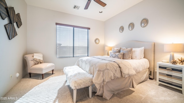 bedroom featuring light colored carpet and ceiling fan