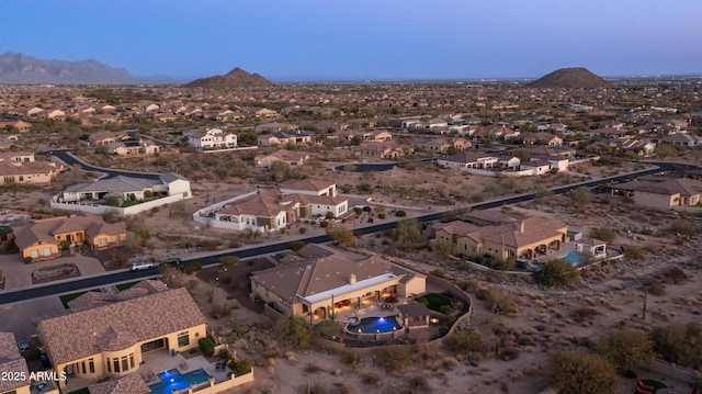 drone / aerial view featuring a mountain view