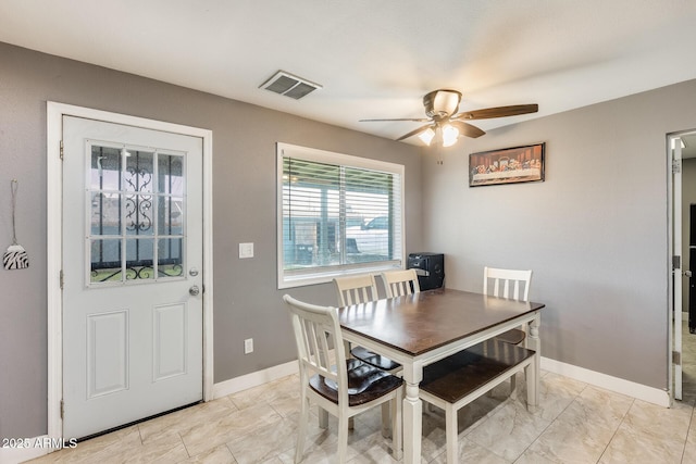 dining area with ceiling fan