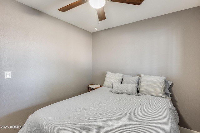 bedroom featuring ceiling fan