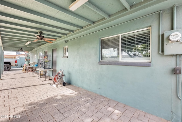 view of patio with ceiling fan