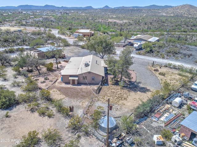 view of subject property featuring a mountain backdrop