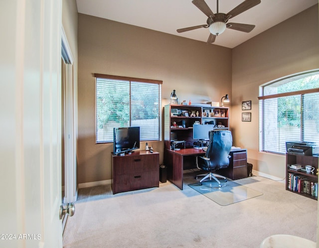 office featuring light colored carpet and ceiling fan