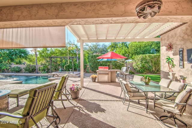 view of patio featuring a fenced in pool, an outdoor kitchen, grilling area, and a pergola