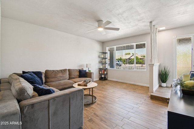 13842 N 40th Ave, Phoenix, AZ 85053 - living room with a ceiling fan, plenty of natural light, and wood finished floors