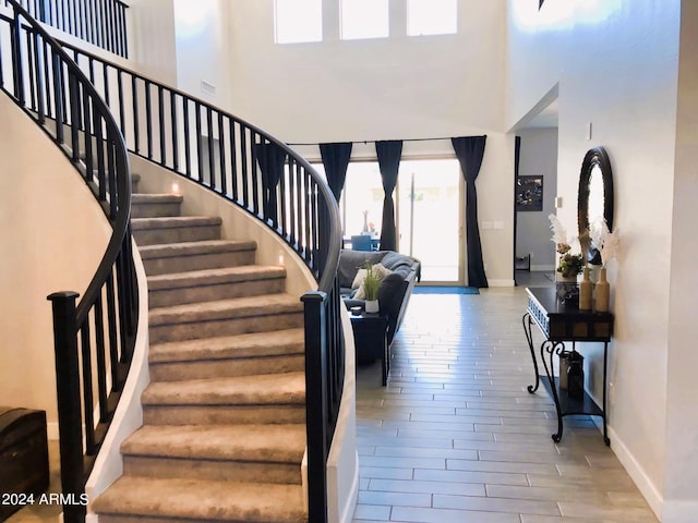 entrance foyer with a towering ceiling