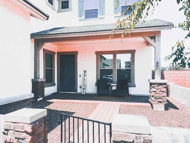 entrance to property with covered porch