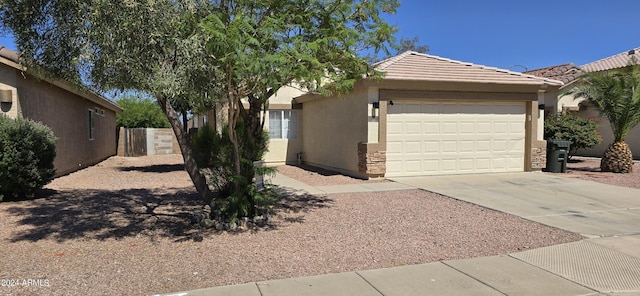 view of front of home with a garage