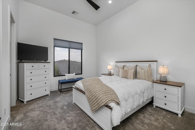 carpeted bedroom featuring ceiling fan and high vaulted ceiling