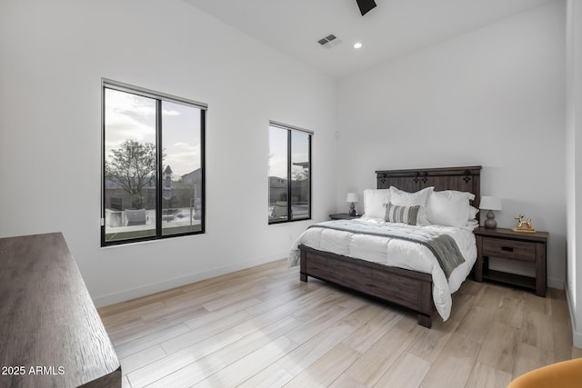 bedroom with light hardwood / wood-style floors