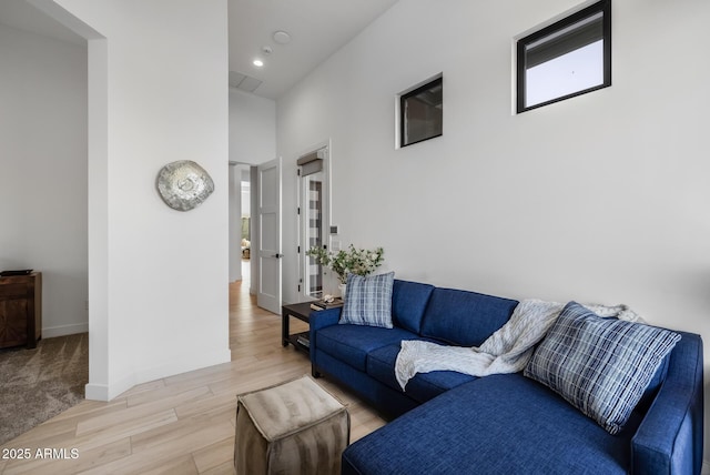 living room with light hardwood / wood-style flooring