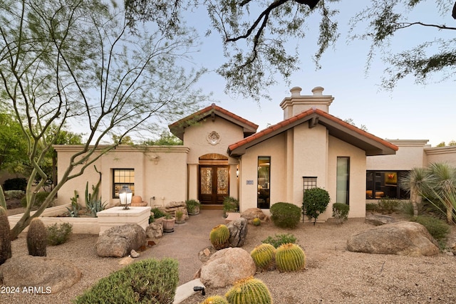 mediterranean / spanish house with french doors