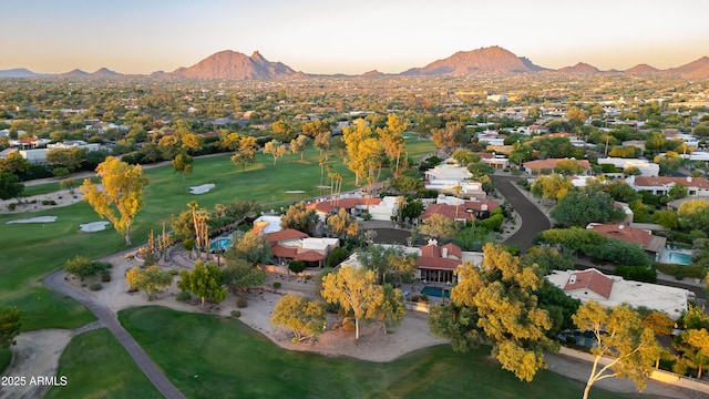 aerial view at dusk with a mountain view